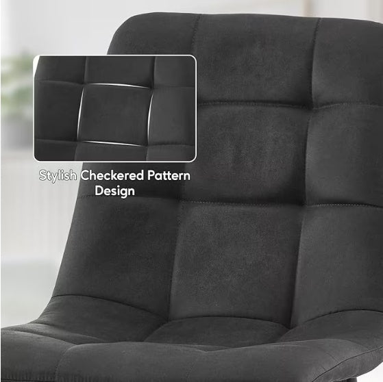 Close-up of black modern kitchen chair set with stylish checkered pattern design upholstery