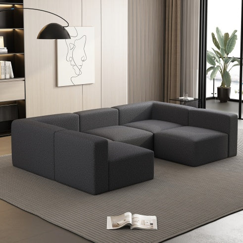 Shopi Vella dark gray modular sectional sleeper sofa in modern living room with neutral decor