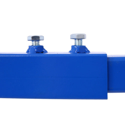 Close-up of blue metal part with bolts on motorcycle engine stand with wheels by Shopi Vella
