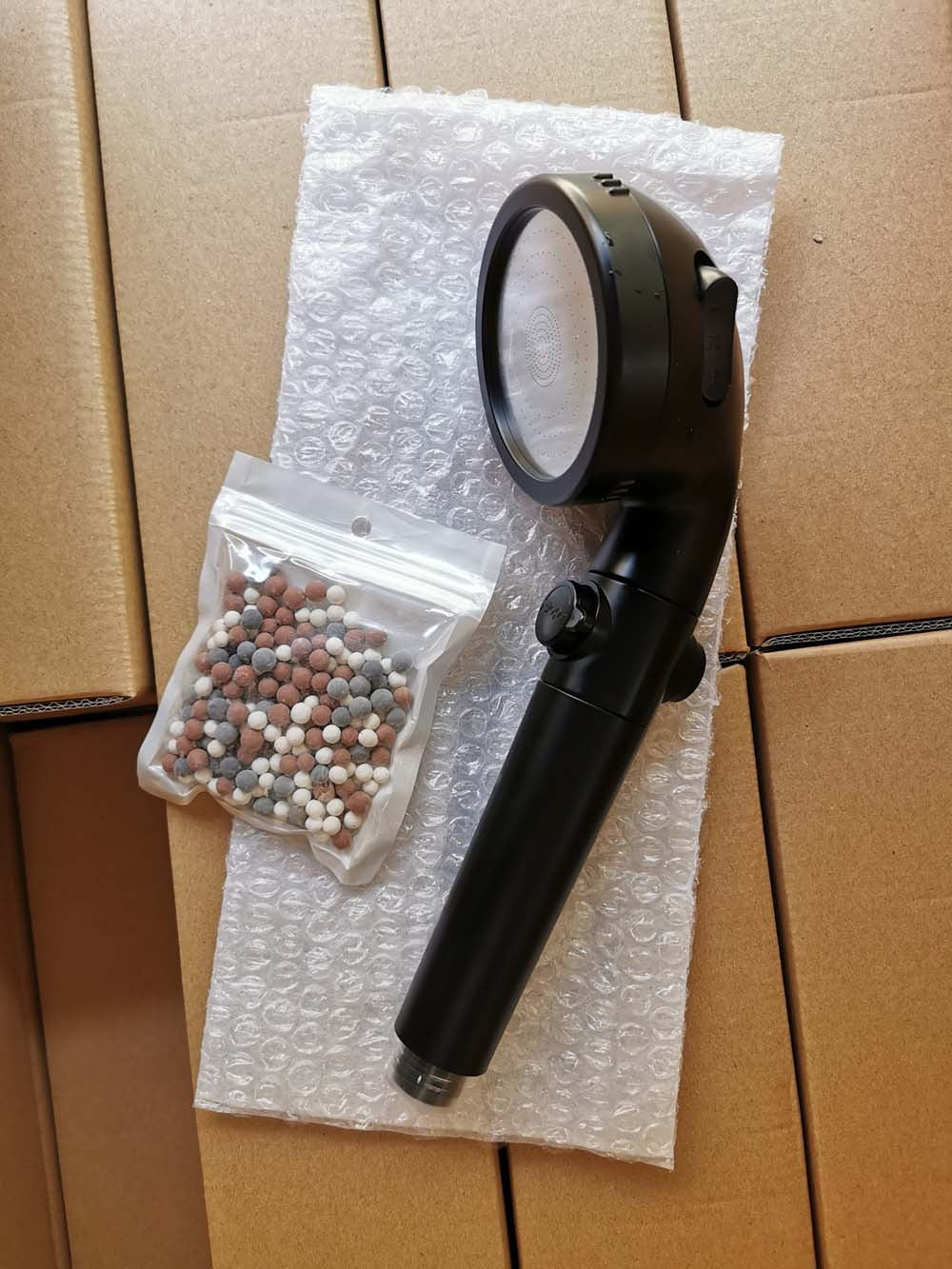 Shopi Vella black negative ion shower head with mineral balls for improved water quality