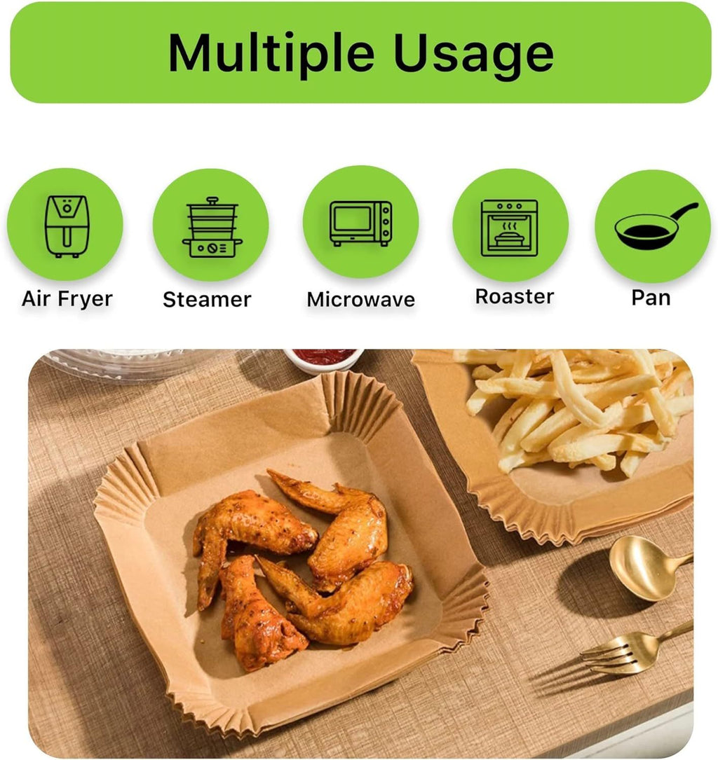 Shopi Vella oil absorbing paper tray for baking with crispy chicken wings and fries on a table