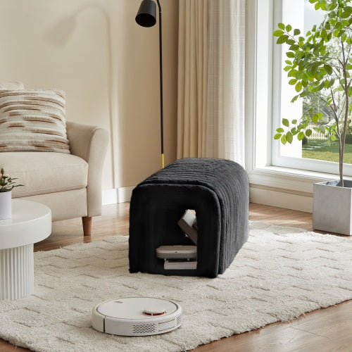 Black ottoman storage bench with pet hideaway in living room near sofa and window