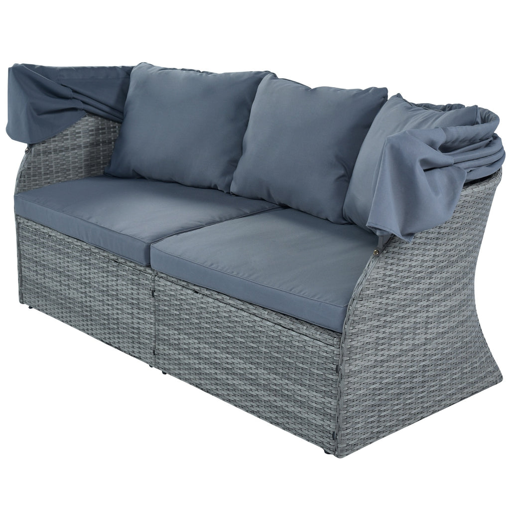 Shopi Vella grey wicker patio furniture set for backyard lounging with blue cushions and pillows