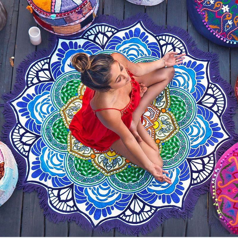 Polygon yoga mat round with colorful mandala design and fringed edges for home storage by Shopi Vella