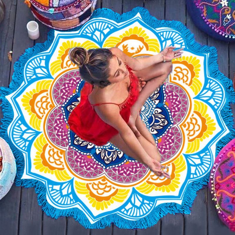 Colorful polygon yoga mat round with blue fringe featuring floral mandala design for home storage and relaxation