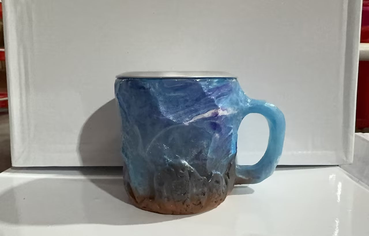 Shopi Vella resin crystal coffee mug with blue and brown artistic design for kitchen storage