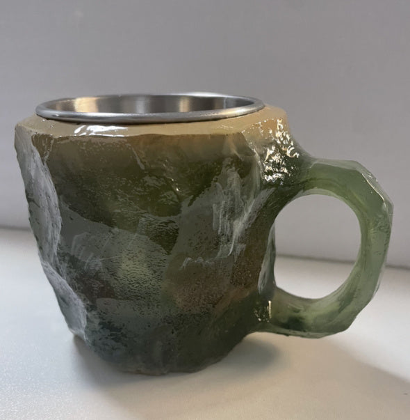 Shopi Vella resin crystal coffee mug with a textured green resin exterior and stainless steel interior