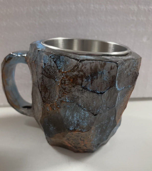 Shopi Vella resin crystal coffee mug with textured dark stone-like exterior and stainless steel interior