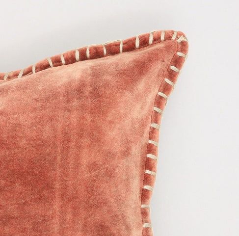 Shopi Vella stonewashed velvet throw pillow with stitched border in soft terracotta color