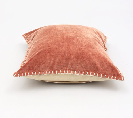 Shopi Vella stonewashed velvet throw pillow case in soft rust color with stitched edges