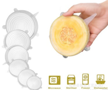 Set of stretch silicone food covers in various sizes sealing a bowl and covering food items