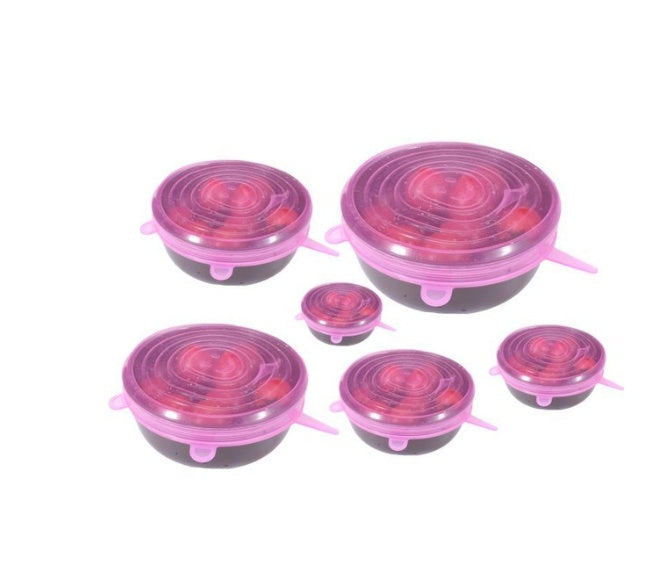 Shopi Vella stretch silicone food covers in pink securing bowls of various sizes for kitchen storage