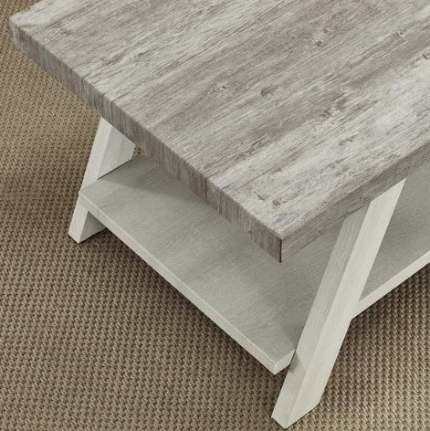 Shopi Vella two tone wooden side table with gray top and white base on a textured brown carpet