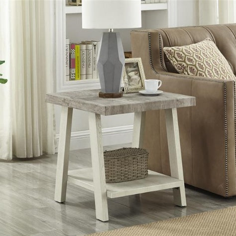 Shopi Vella two tone wooden side table with lower storage shelf holding a wicker basket next to a beige sofa
