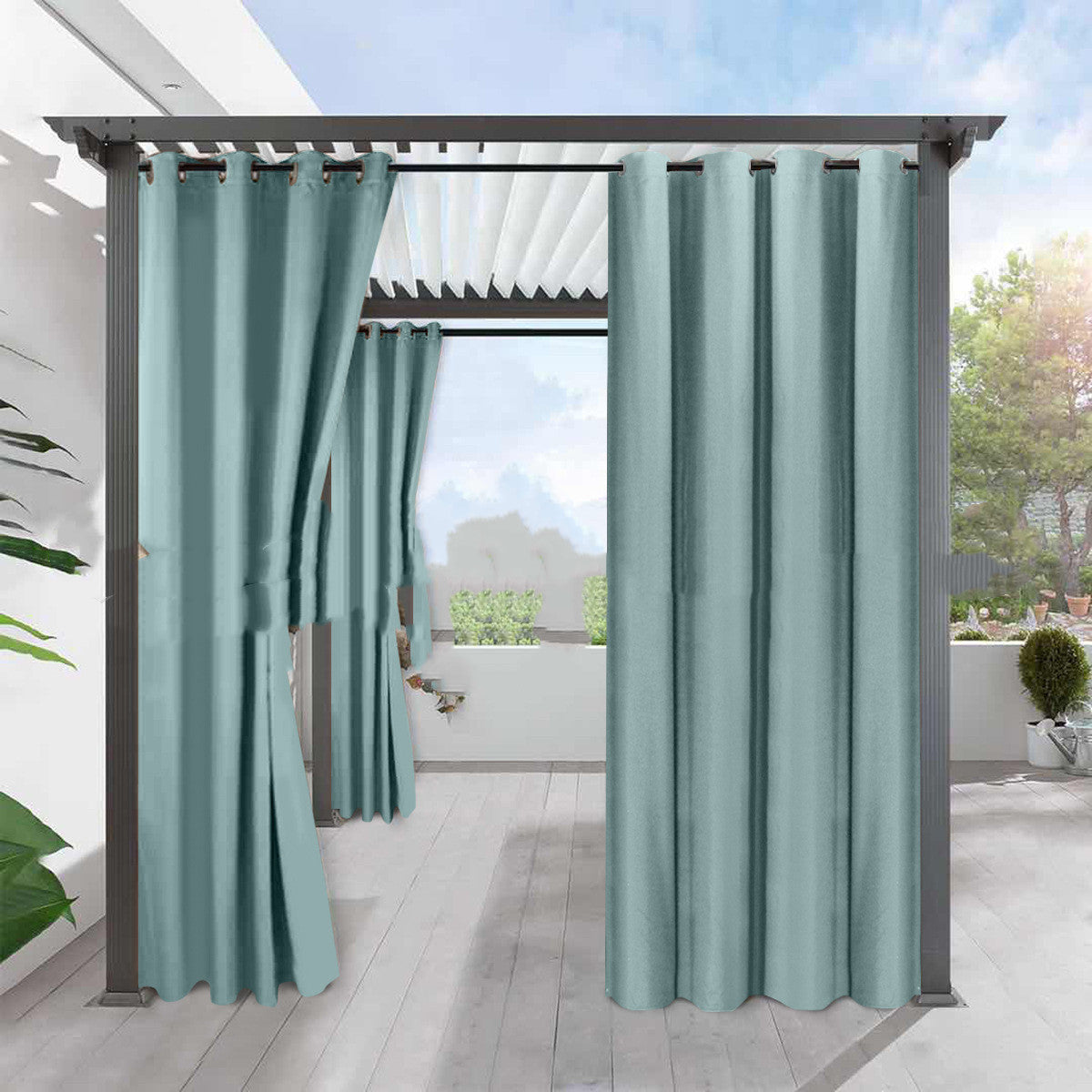 Shopi Vella waterproof heat insulation curtain in blue hanging on outdoor patio frame