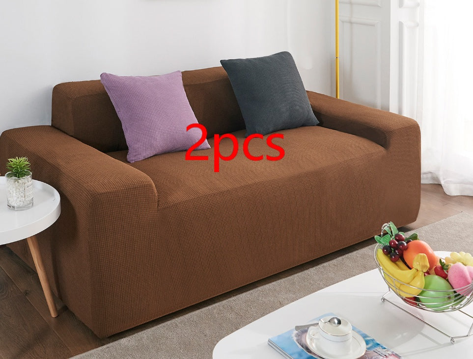 Shopi Vella brown waterproof sofa slipcover on modern sofa with decorative pillows in living room