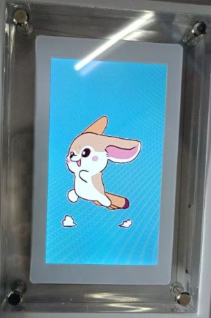 Shopi Vella vertical digital photo frame with battery displaying a cute animated bunny on blue background