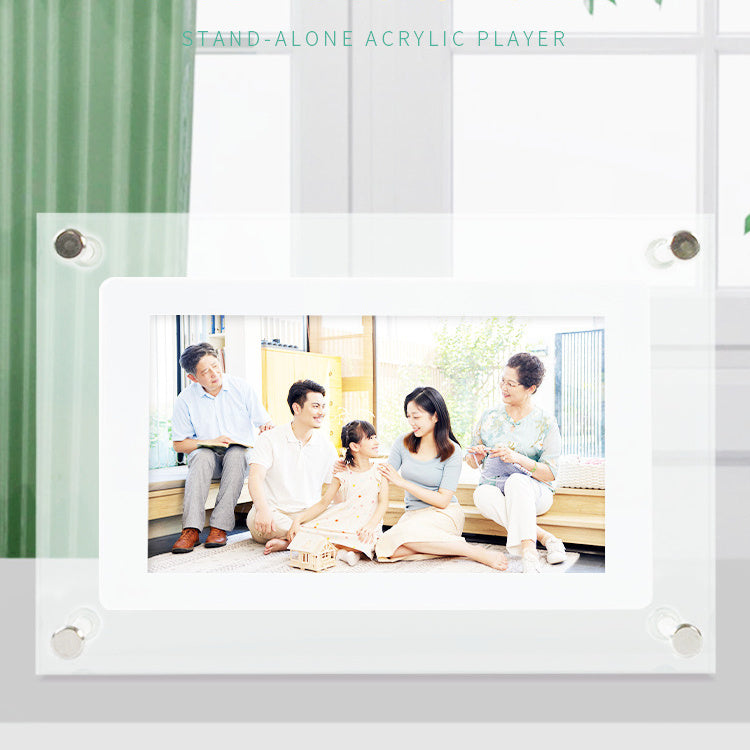 Shopi Vella vertical digital photo frame with battery displaying a family photo in a clear acrylic stand-alone player