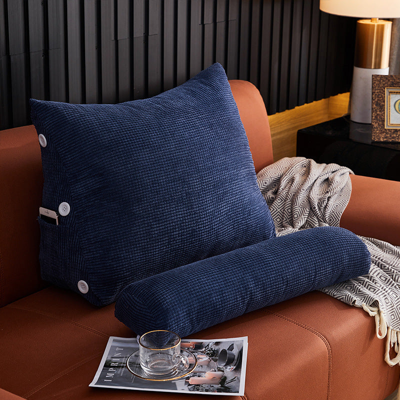 Shopi Vella navy blue pillow case on waist backrest pillow placed on brown sofa with cozy blanket