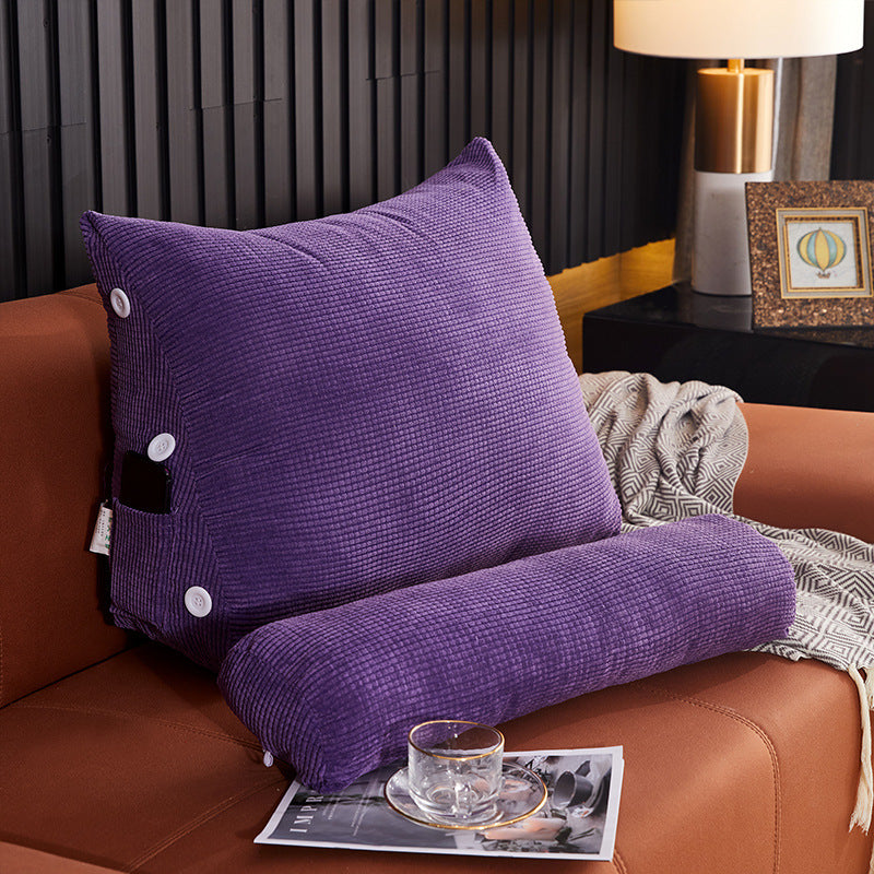 Purple waist backrest pillow with buttoned pillow case on brown sofa by Shopi Vella