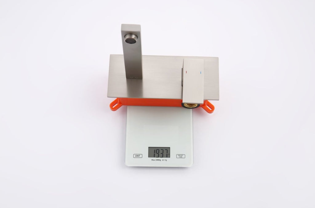 Shopi Vella wall mount bathroom faucet brushed nickel displayed on digital scale