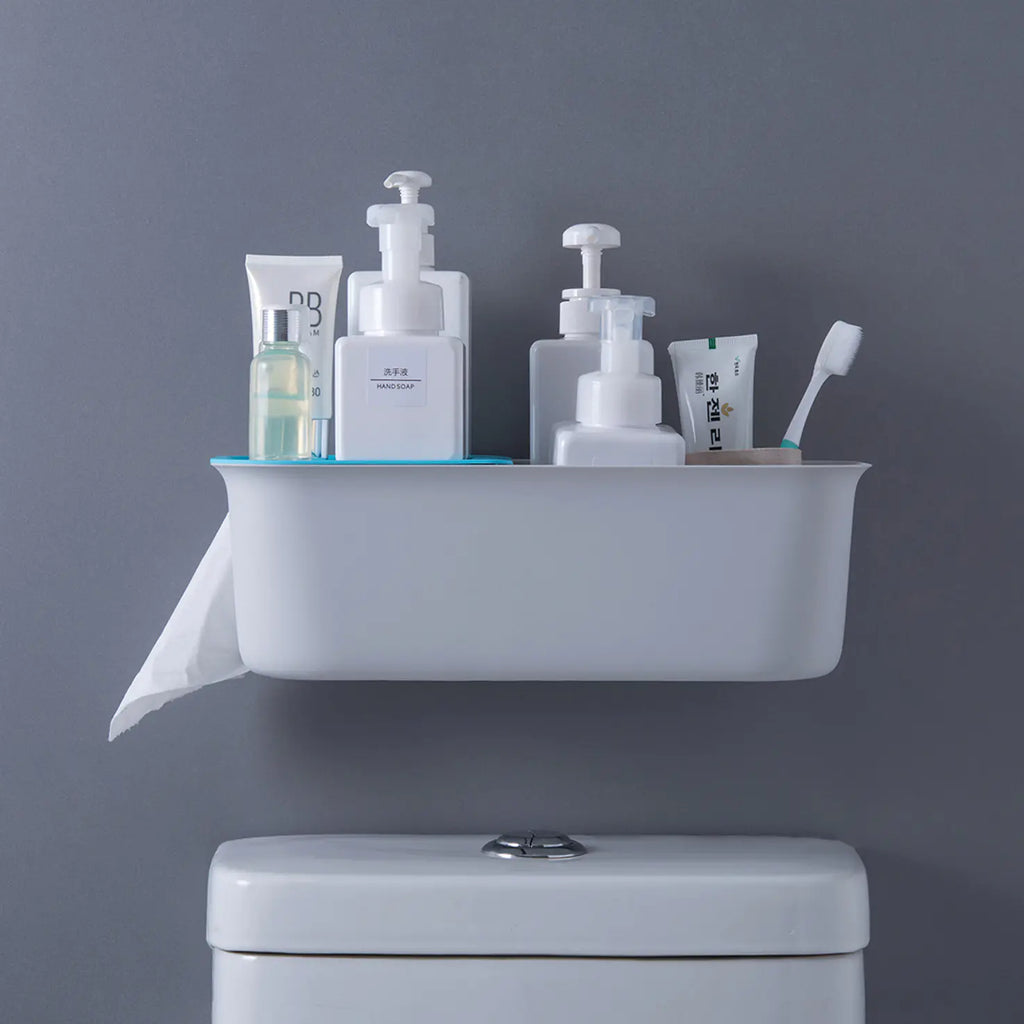 Wall mounted bathroom storage rack holding toiletries above a toilet with gray wall background