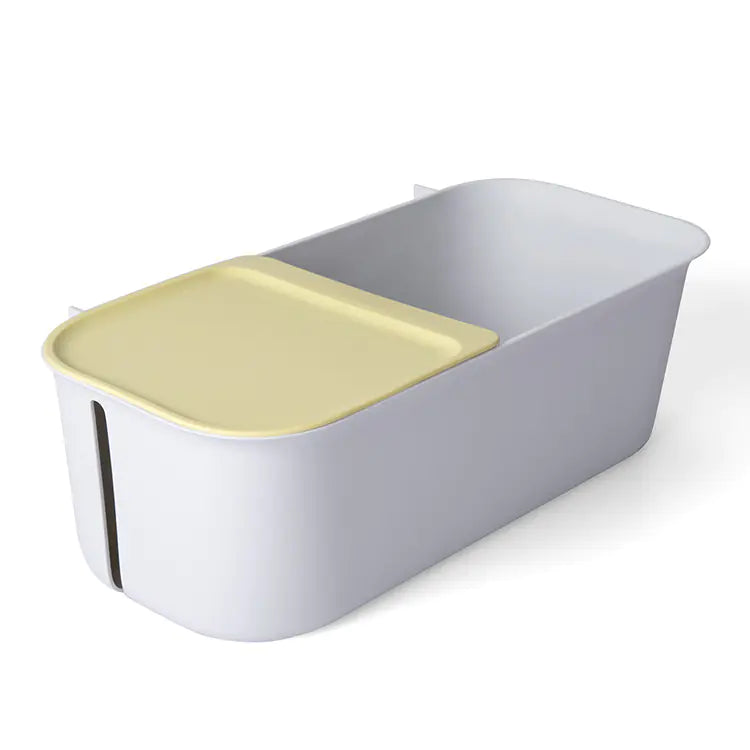 Compact wall mounted bathroom storage rack with dual compartments and a sliding yellow lid
