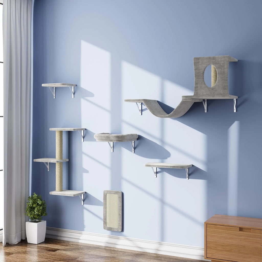 Gray wall mounted cat furniture set with shelves, scratching post, and cozy cubby on blue wall