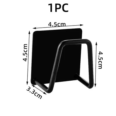 Compact black wall mounted sponge holder for kitchen with metal frame and adhesive backing