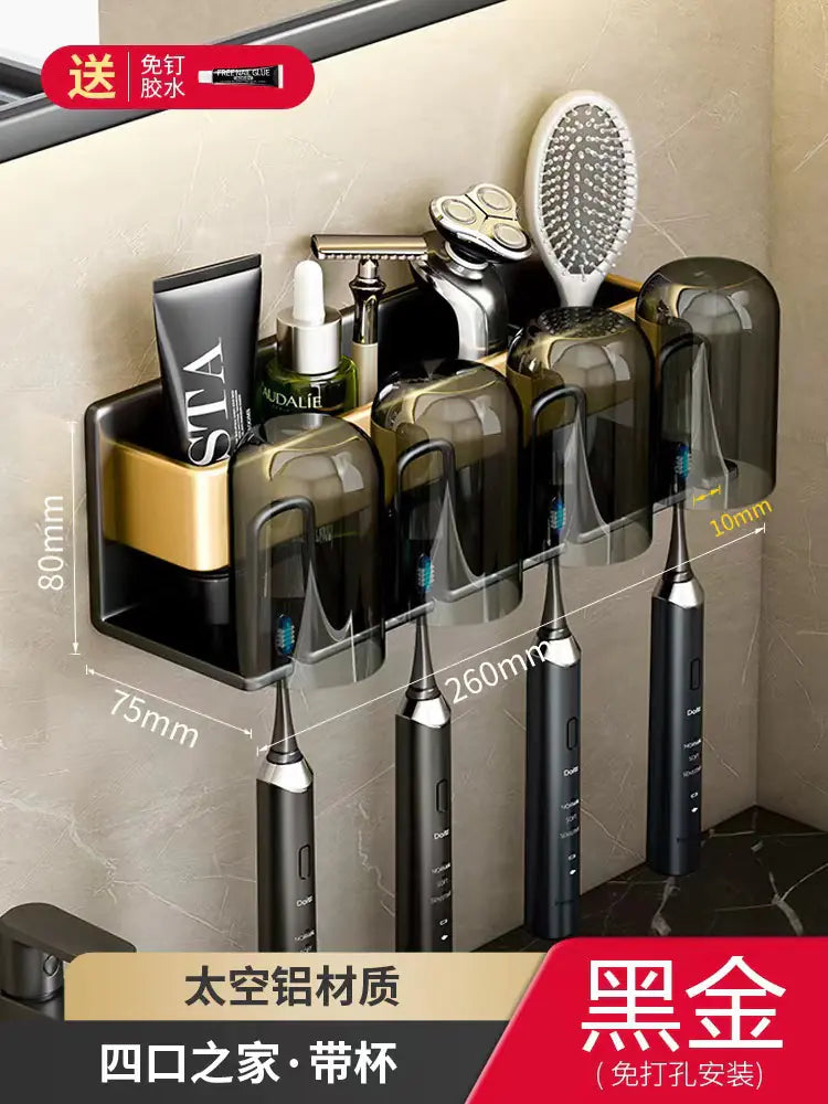 Wall-mounted toothbrush holder with four compartments and covers in black and gold for bathroom organization