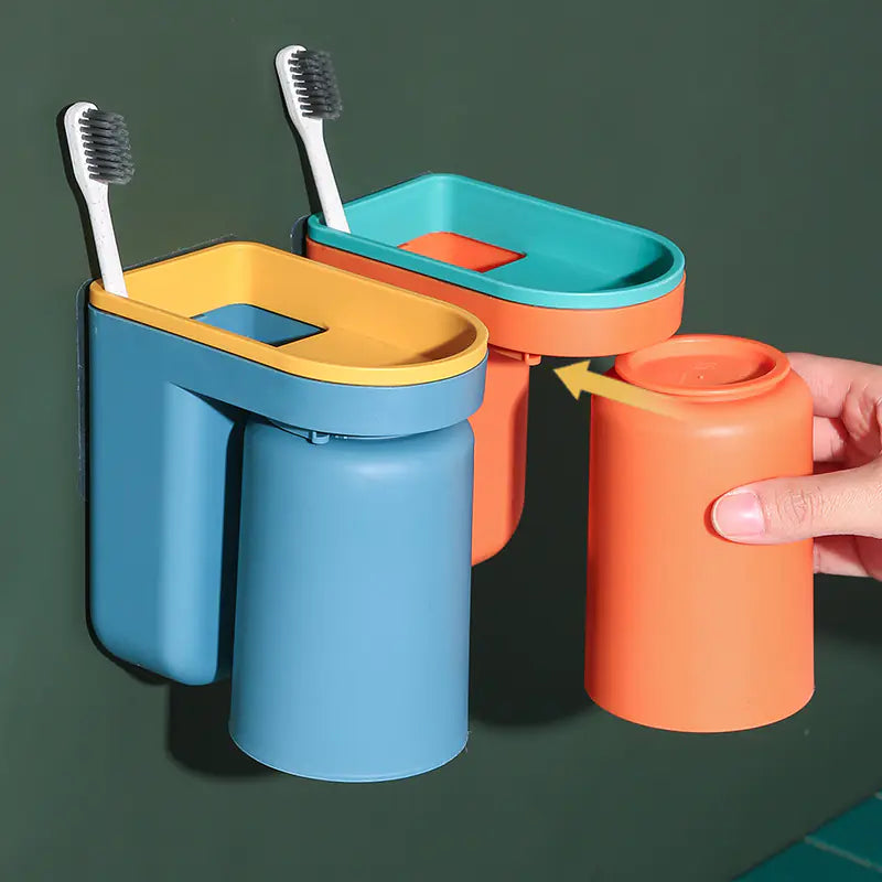 Colorful wall-mounted toothbrush holder with detachable cups and slots for toothbrushes in blue, yellow, orange, and teal