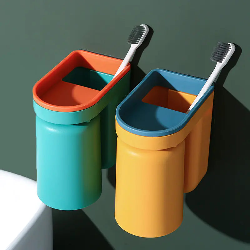 Colorful modern wall-mounted toothbrush holder with two toothbrushes and matching cup holders