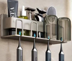 Wall-mounted toothbrush holder with four electric toothbrush slots and additional storage for grooming accessories