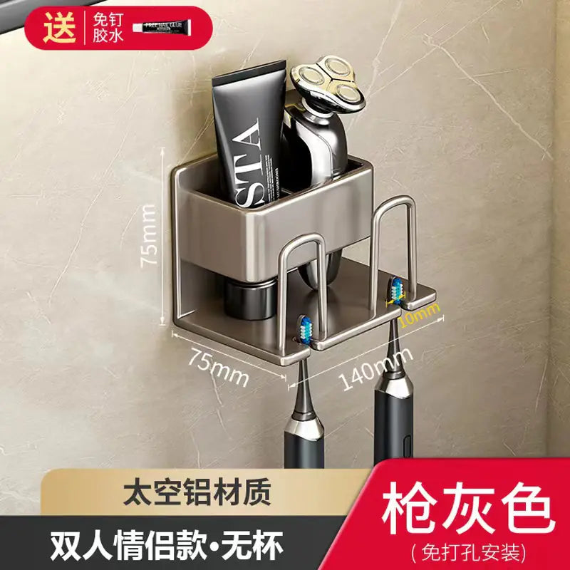 Modern gray wall-mounted toothbrush holder with storage for razors and toothpaste on bathroom wall