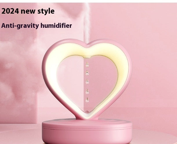 Shopi Vella water droplet backflow humidifier in pink heart shape with mist and LED light