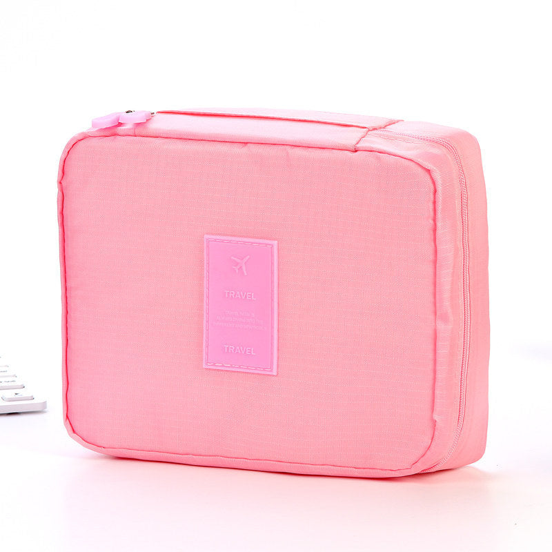 Pink waterproof cosmetic organizer with pockets from Shopi Vella for bathroom storage and travel