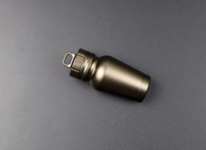 Shopi Vella waterproof medicine bottle for outdoors in durable metal with secure screw cap