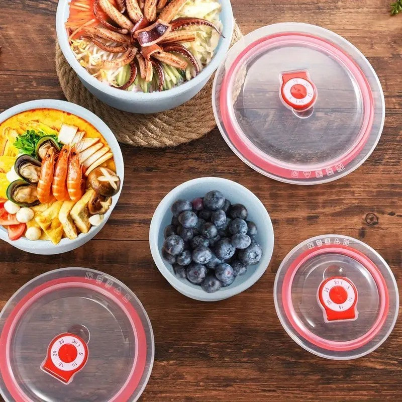 Shopi Vella wheat straw food storage bowls set with clear lids containing seafood, fruit, and vegetables