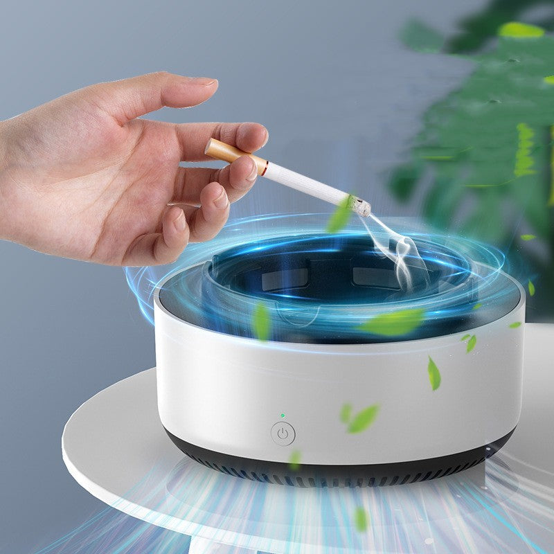 Shopi Vella smoke removal air purifier ashtray in white with hand holding a cigarette over it