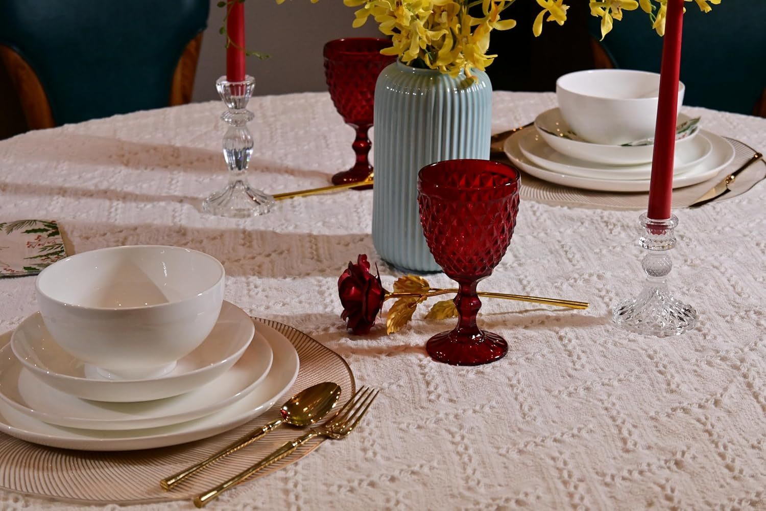 Shopi Vella white dinnerware set for 4 with bowls, plates, and gold flatware on a textured tablecloth