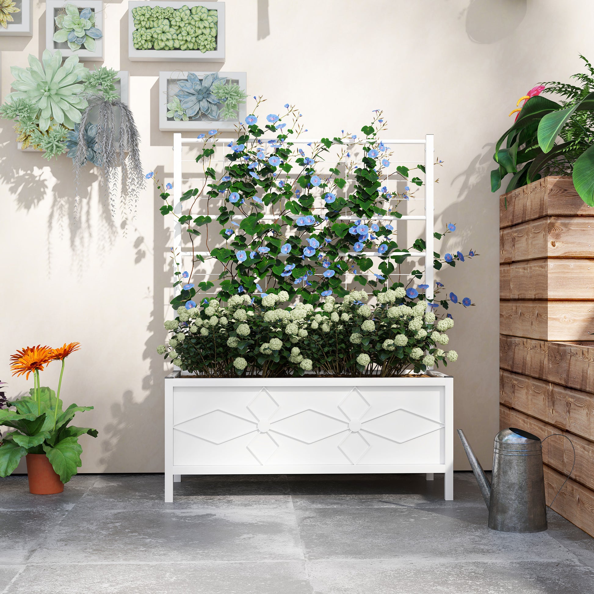 Shopi Vella outdoor planter box with trellis in white holding blooming flowers on patio