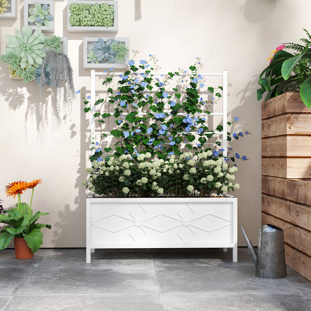 Shopi Vella outdoor planter box with trellis in white holding flowering plants on a patio