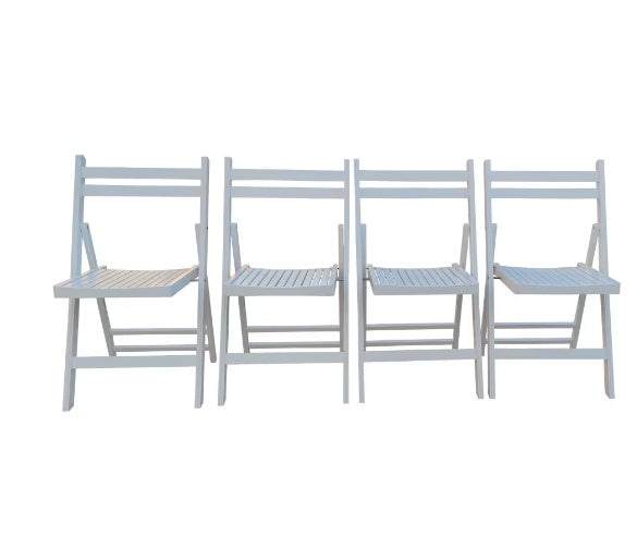 Set of four white slatted wood folding chairs by Shopi Vella with simple and functional design