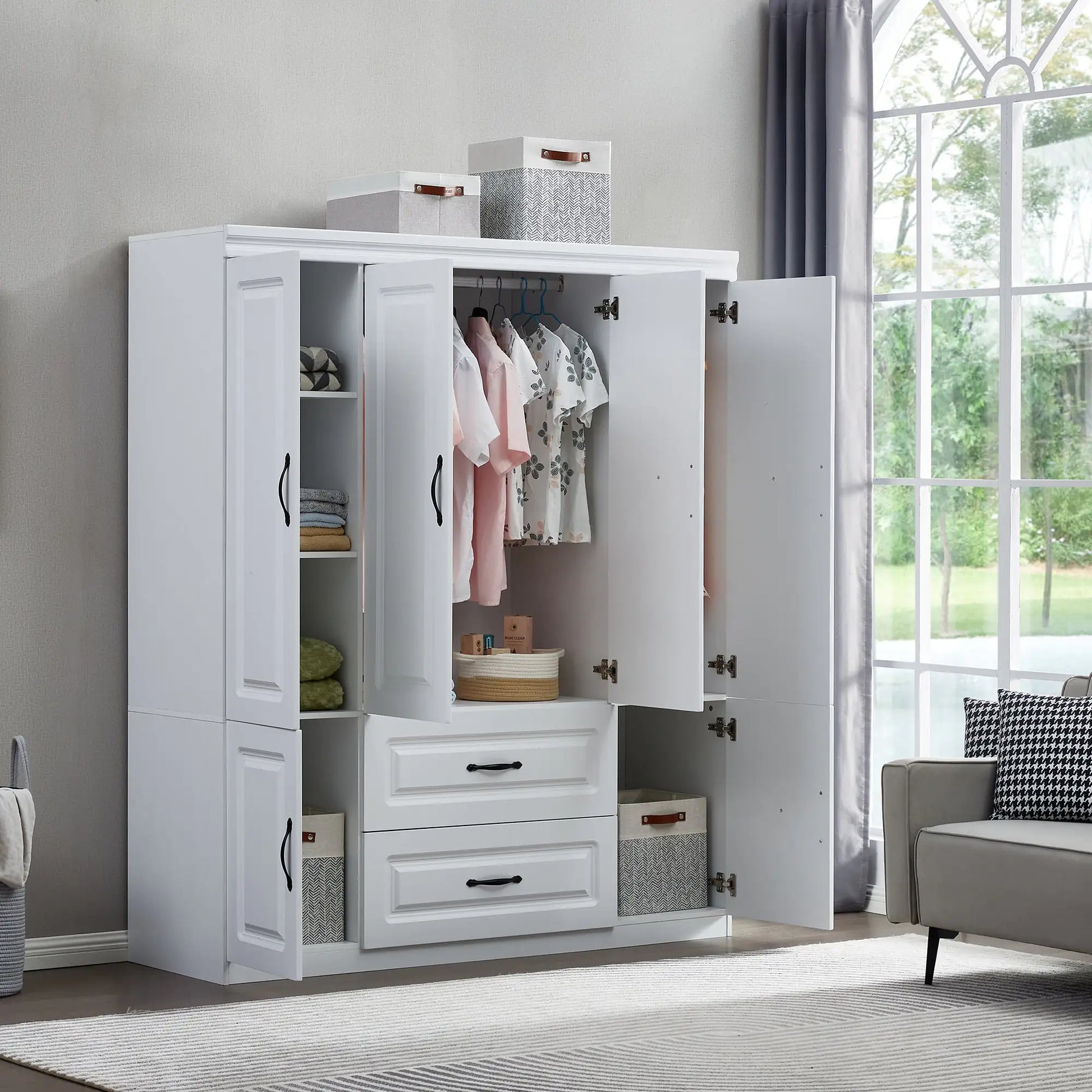 White solid wood wardrobe closet with multiple doors, drawers, and hanging space in a modern bedroom