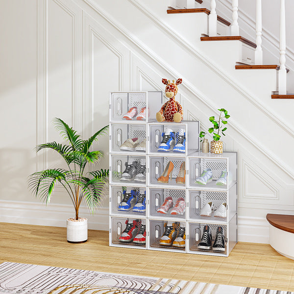 White stackable shoe box set from Shopi Vella neatly organizing various shoes under a staircase