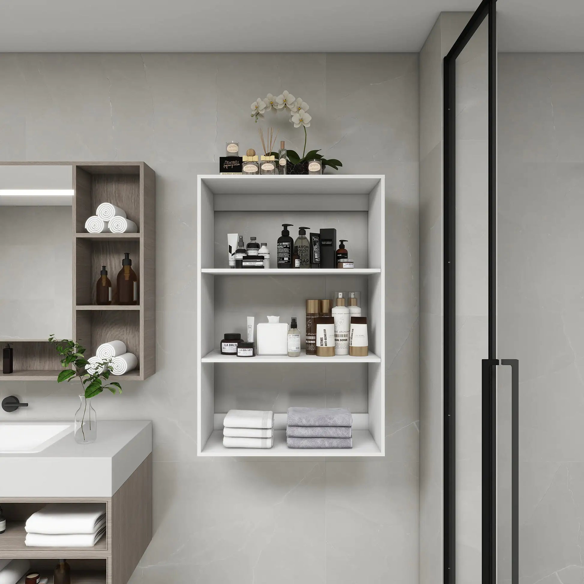 Modern white wall mounted bathroom shelves with toiletries towels and decorative orchid in a stylish bathroom