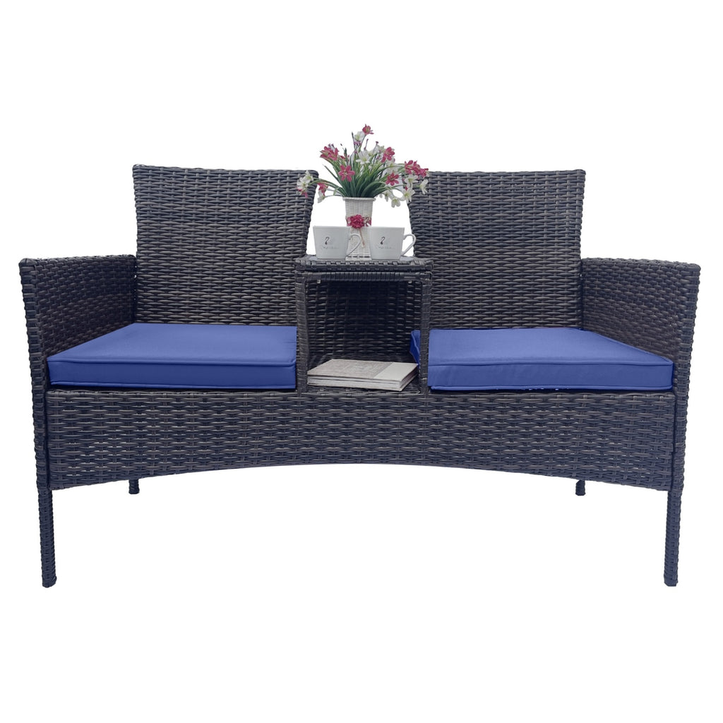 Shopi Vella wicker patio furniture set with dark brown woven design and blue seat cushions with central table