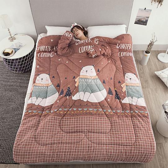 Shopi Vella winter quilt with sleeves featuring bear design and winter is coming text on bed
