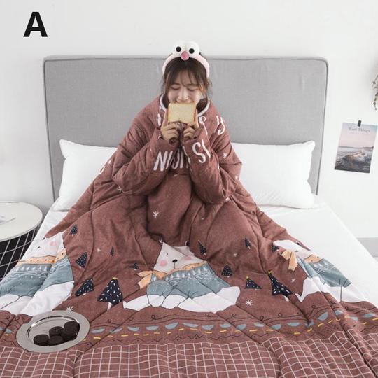 Shopi Vella winter quilt with sleeves featuring a cozy mountain and bear pattern on a bed