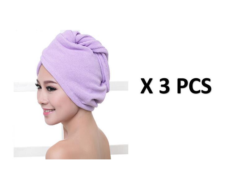 Set of three women's hair drying towel wraps in soft purple microfiber fabric